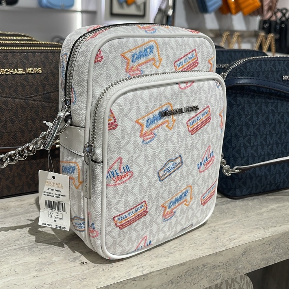 MICHAEL KORS
Jet Set Md Printed Signature Logo Crossbody NS CHAIN XBODY Flight - Picture 9 of 16